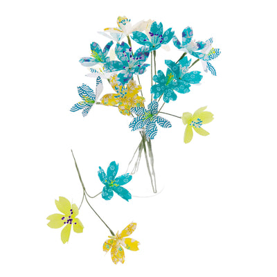 photo d'ambiance d'un kit bouquet fleurs de cerisier « majorque » dans les tons turquoise, vert acidulé et jaune moutarde monté en bouquet