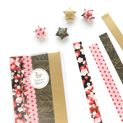 packaging du kit d'étoiles en origami et papier japonais rouges, noirs et dorés « sakurajima » adeline klam