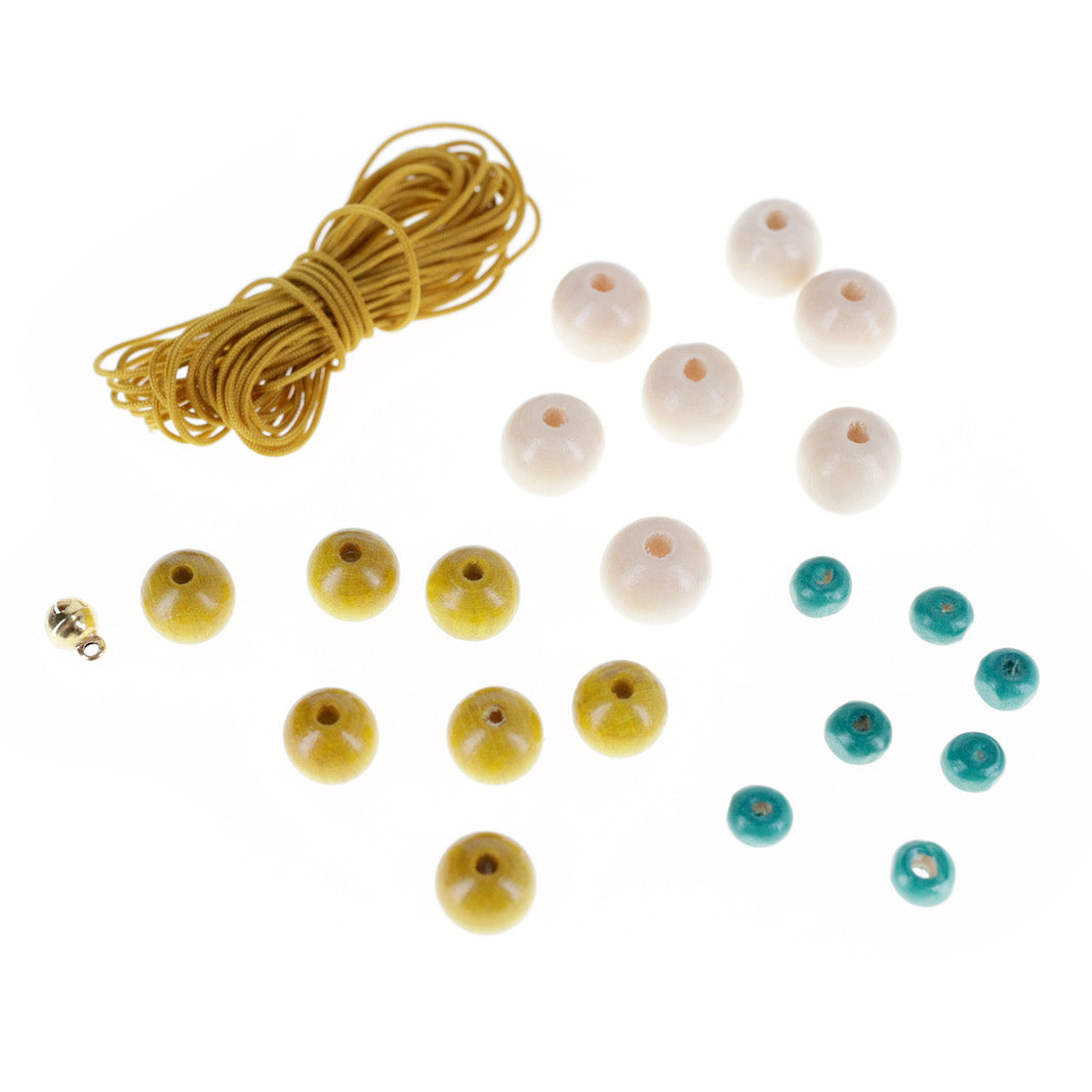 lot de fil, perles et grelot dans les tons jaune moutarde, bleu turquoise et bois naturel adeline klam (N2)