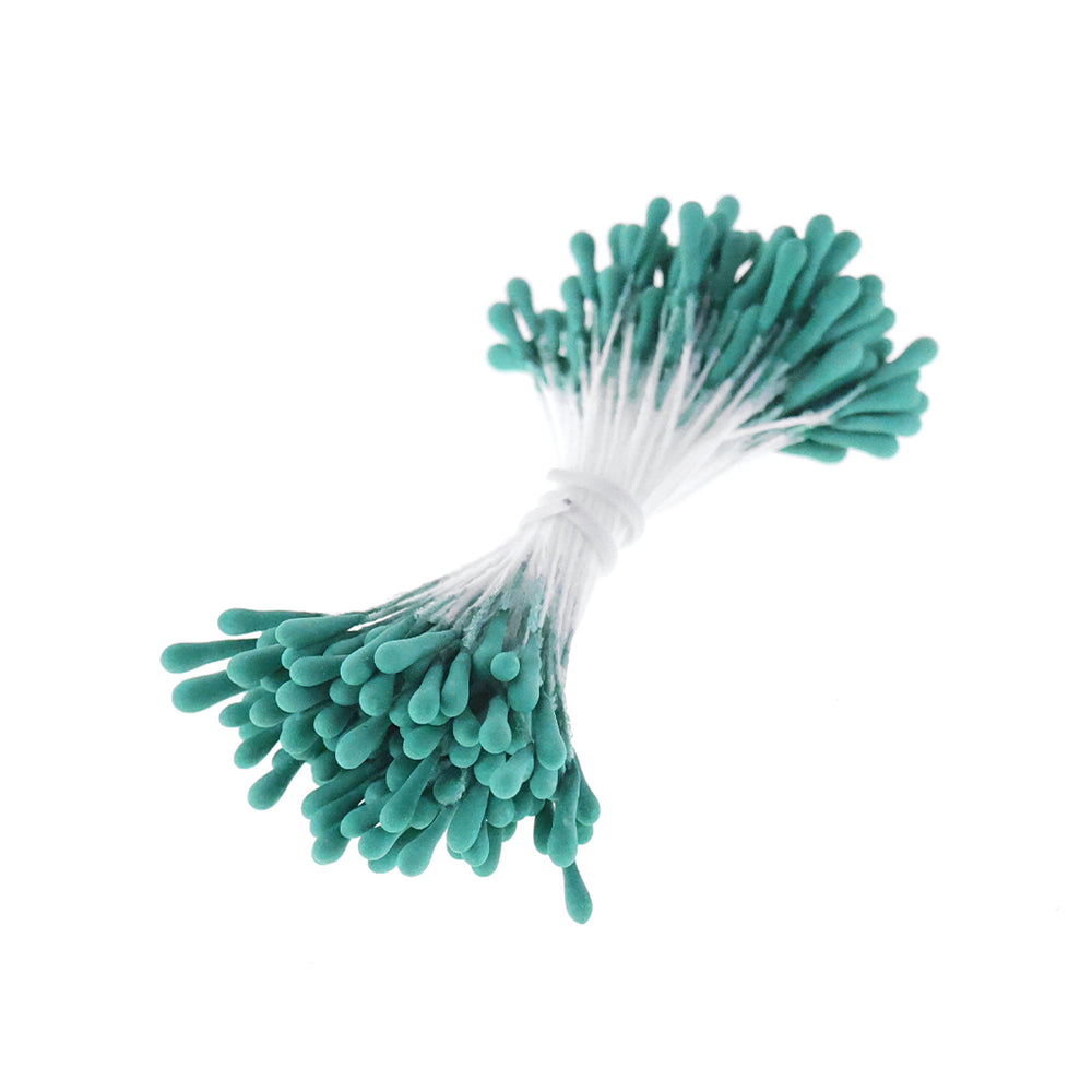 photo packshot du fagot de pistils de fleurs bleu pétrole et blanc 1049
