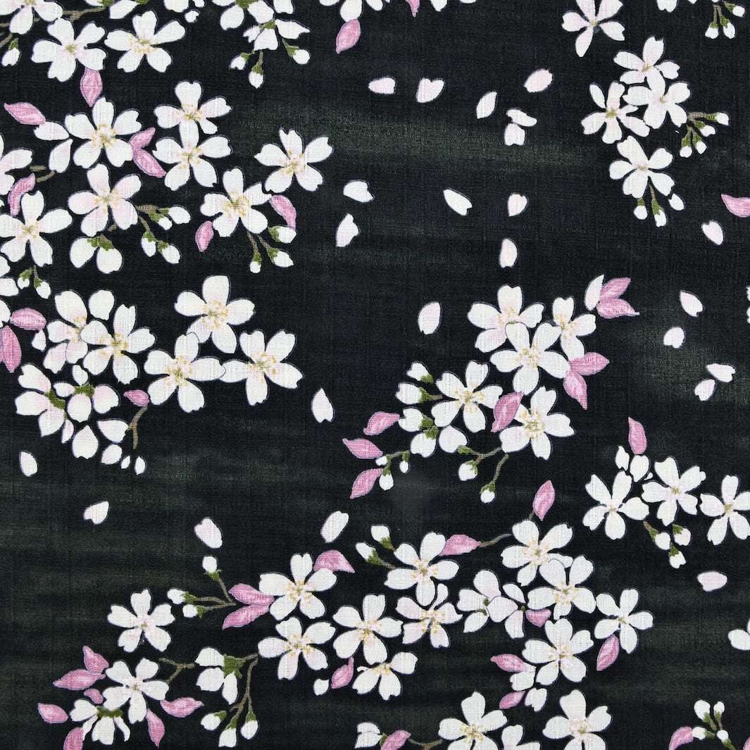 photo packshot du tissu japonais aux motifs de fleurs de cerisier dessinées dans les tons noirs, roses et vert T552