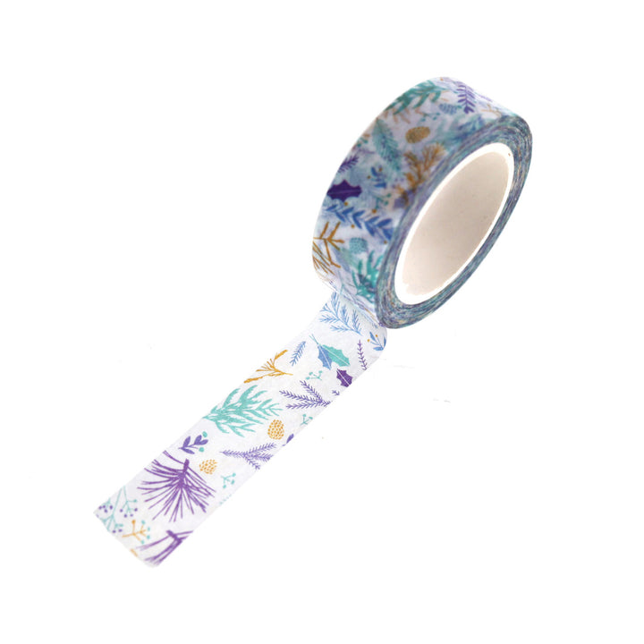 photo packshot vue de biais du ruban adhésif décoratif aux motifs de feuillages variés, violets, vert d'eau, jaune moutarde et bleus