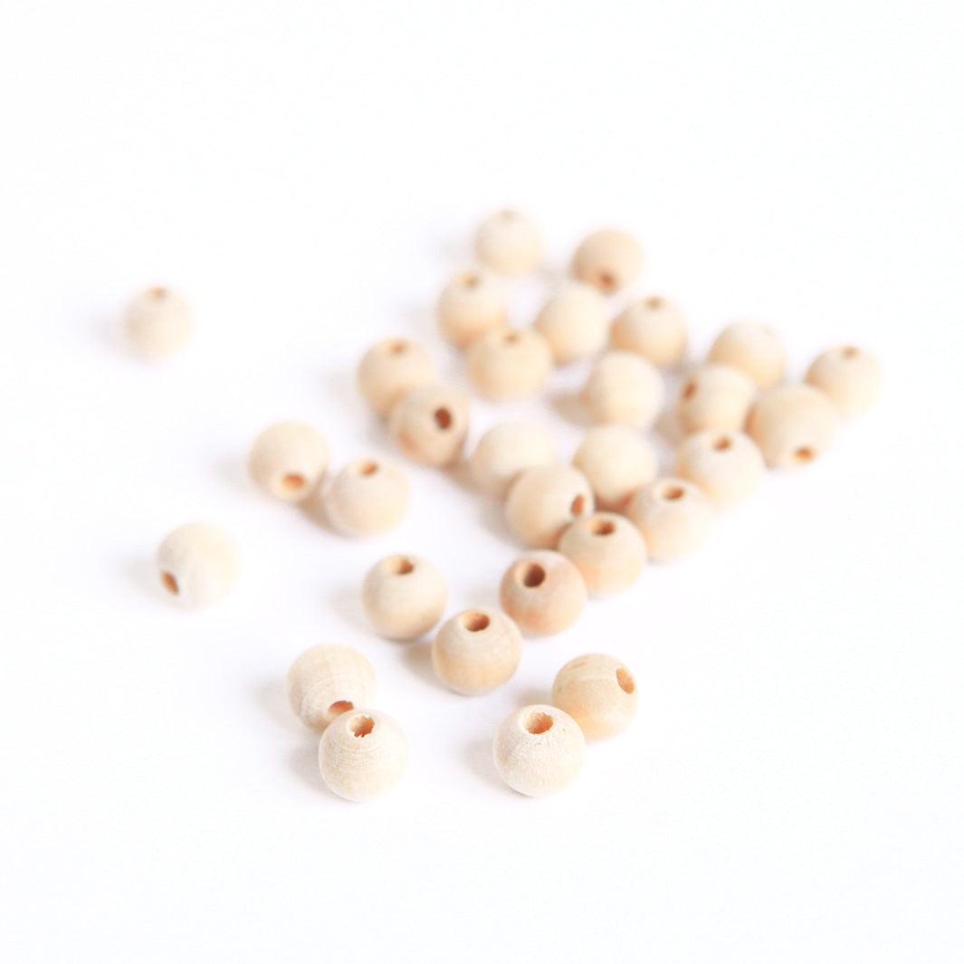 Lot de 30 perles en bois - Naturel - 7mm