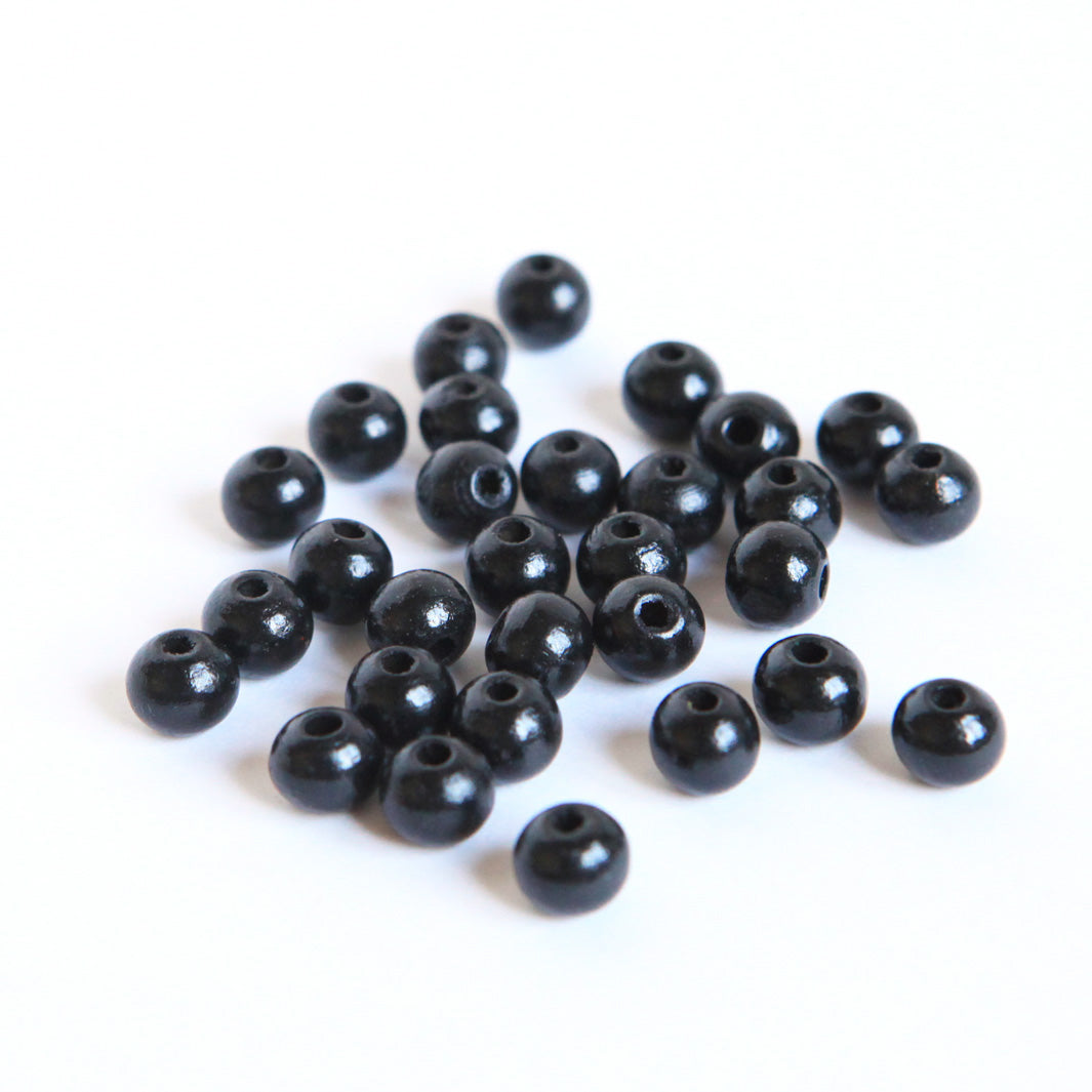 Lot de 30 perles en bois - Noir - 8mm