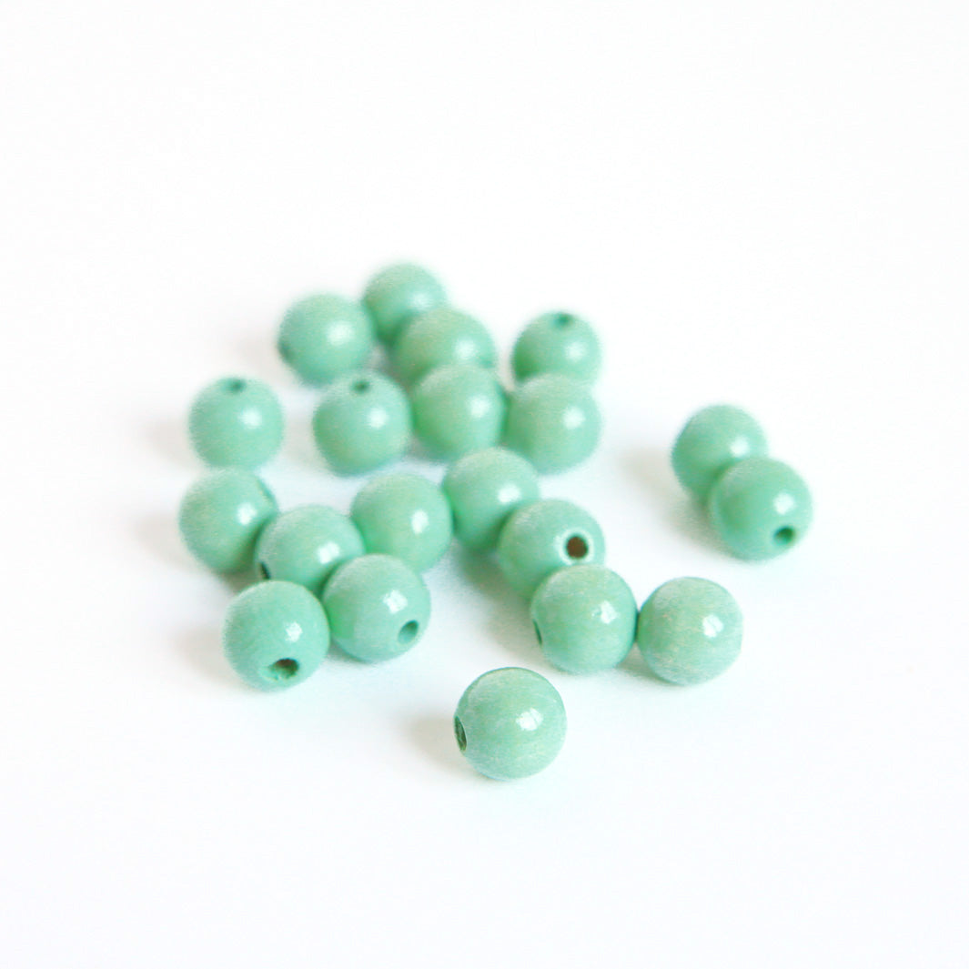 Lot de 20 perles en bois - Vert d'eau - 10mm