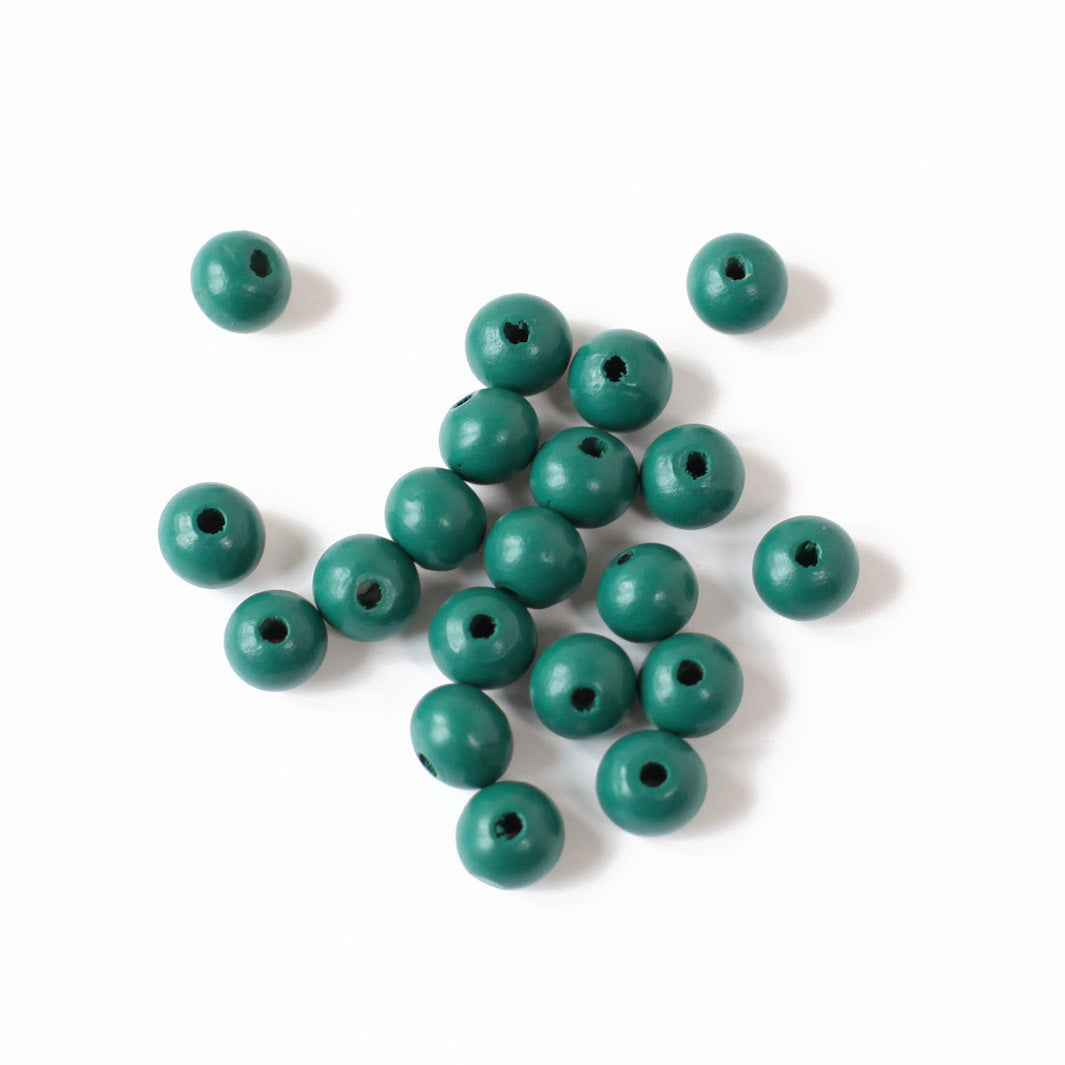 Lot de 20 perles en bois - vert sapin - 9mm