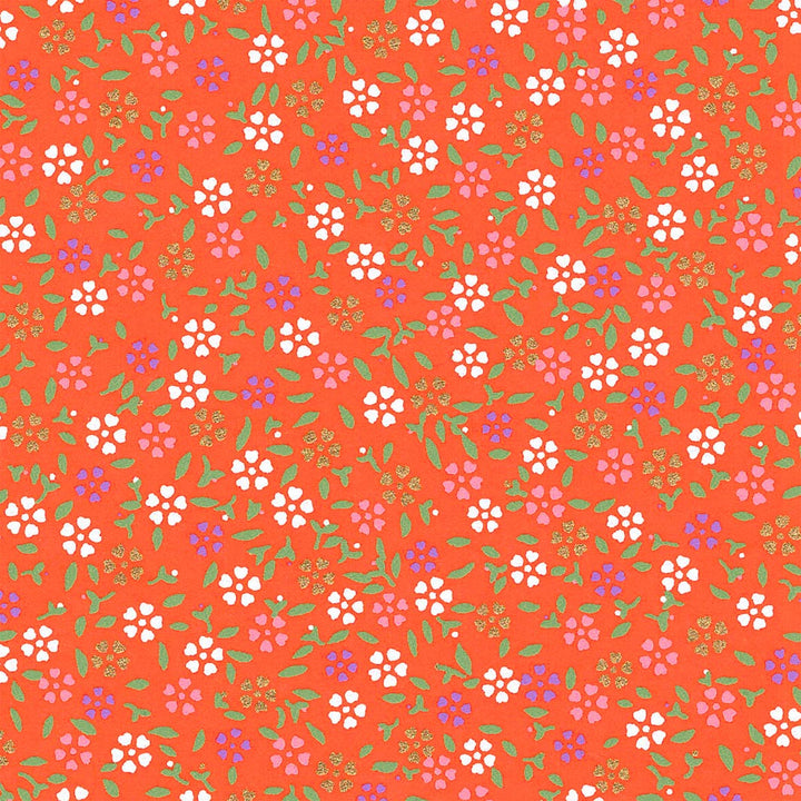 carré de 10cm par 10cm de papier japonais yuzen chiyogami aux motifs de mini fleurs de cerisier dans les tons rouge orange adeline klam (M663)