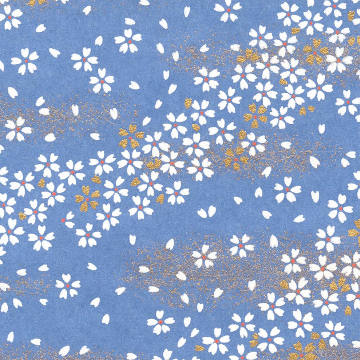 carré de 10cm par 10cm de papier japonais yuzen chiyogami aux motifs de petites fleurs au vent sur fond bleu pervenche adeline klam (M983)