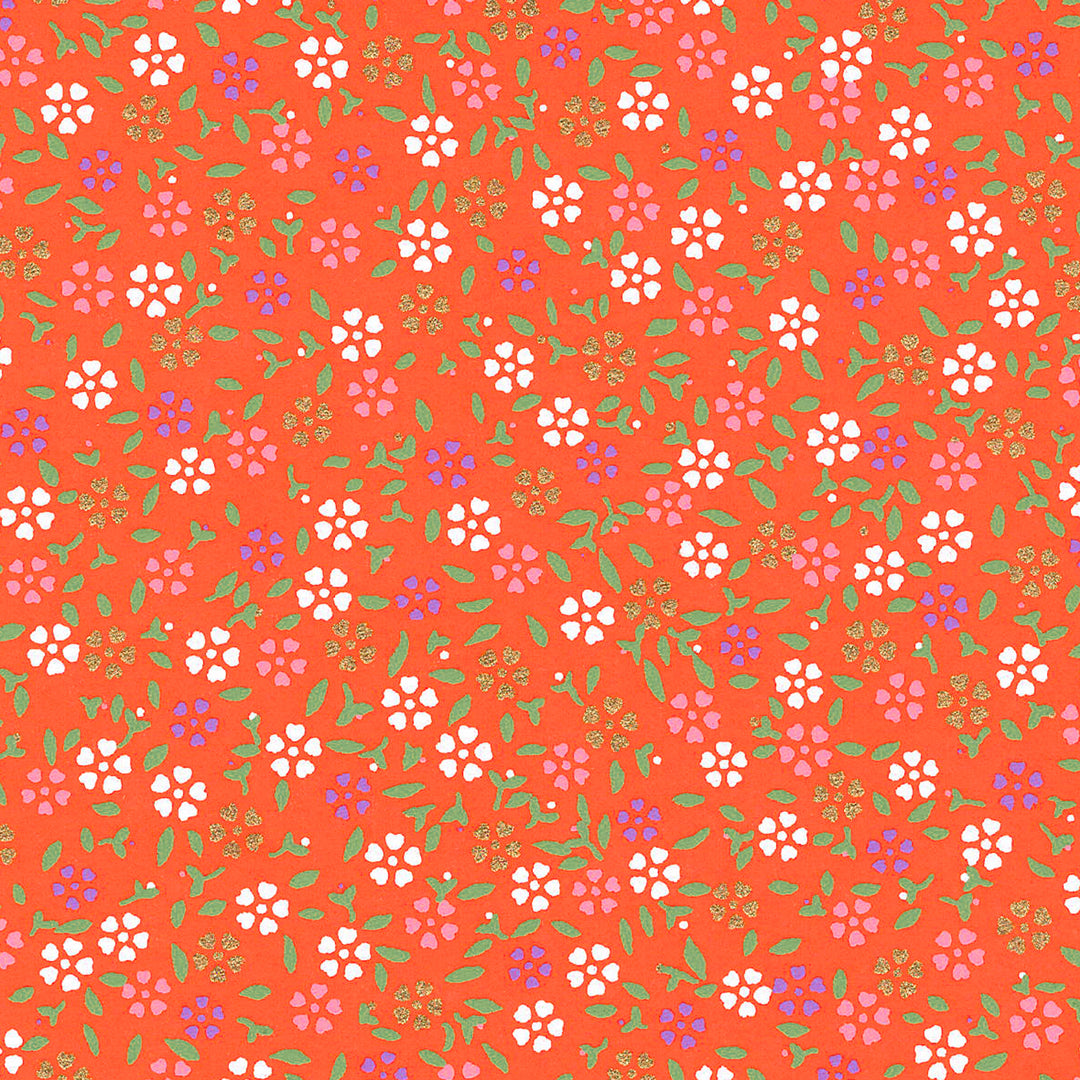 carré de 10cm par 10cm de papier japonais yuzen chiyogami au motif de mini fleurs de cerisier sur fond rouge orange adeline klam (M964)