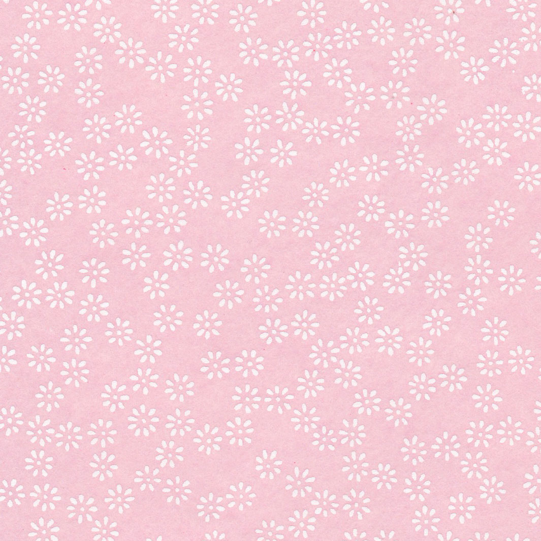 carré de 10cm par 10cm de papier japonais yuzen chiyogami aux motifs de semi de fleurs blanches sur fond rose clair adeline klam (M481)