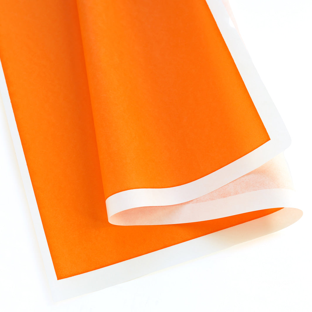 photo packshot d'une courbe du papier japonais yuzen chiyogami uni orange carotte adeline klam (U1042)
