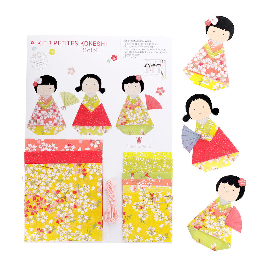 photo packshot et kokeshi montées du kit 3 petites kokeshi dans les tons jaunes, corail, rose rouge et vert acidulé de la gamme « soleil » adeline klam