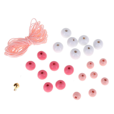 lot de fil, perles et grelot dans les tons rose clair et vif et blancs adeline klam (E2)