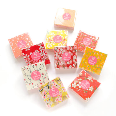 packaging d'un set de 100 papiers origami en 6cm par 6cm « multifruits » dans les tons jaunes, orange, rouges et roses 