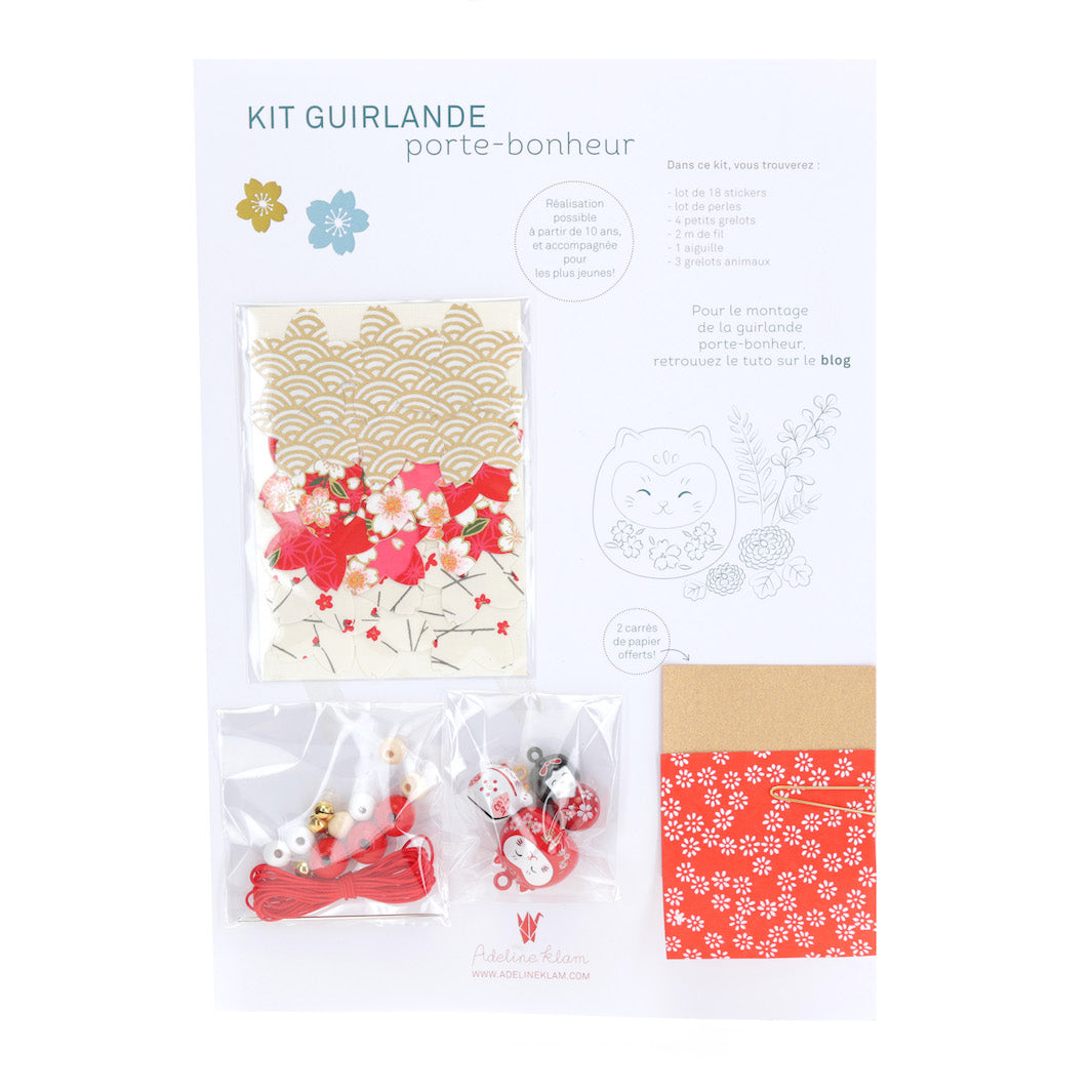 packshot du kit guirlande porte-bonheur blanc cassé, rouge et or « goji » N1 adeline klam