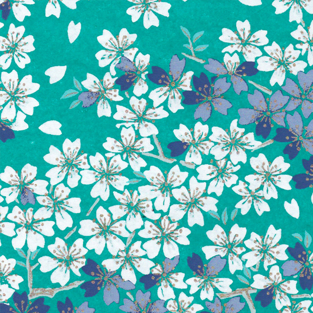 papier japonais au motif de fleurs de cerisier blanches, mauve et violets sur fond turquoise