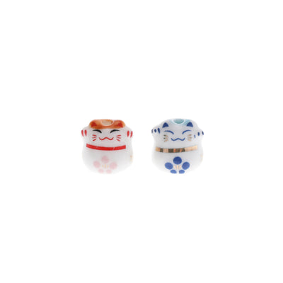 photo de face de perles en céramique en forme de petit maneki-neko