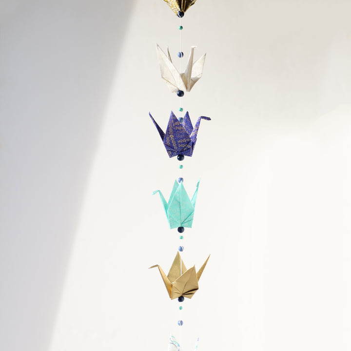 photo d'ambiance de la guirlande montée de l'atelier guirlande de grues