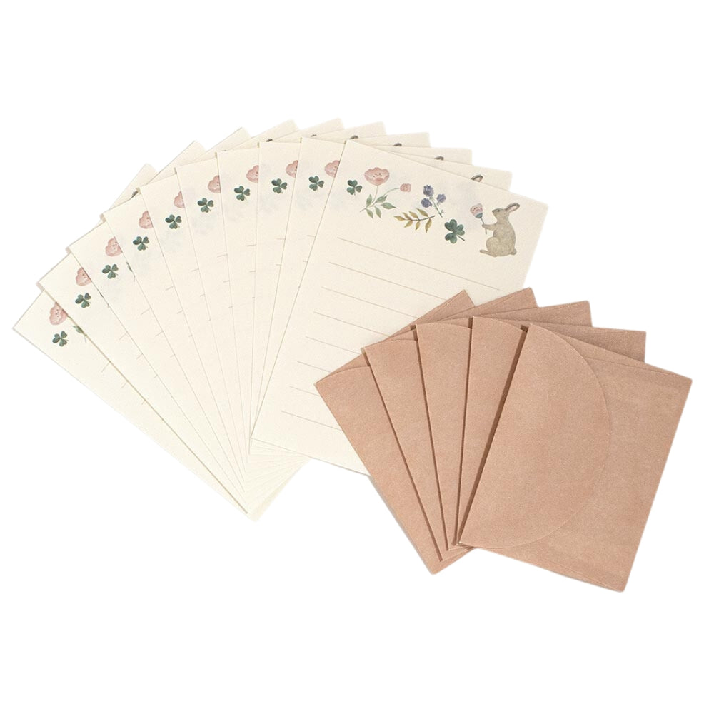 photo packshot de l'assortiment d'enveloppes et de papier à lettres du mini set de 10 papiers à lettre et 5 enveloppes roses aux motifs de lapin, de trèfle et de fleurs de nb bo., ltd. japan