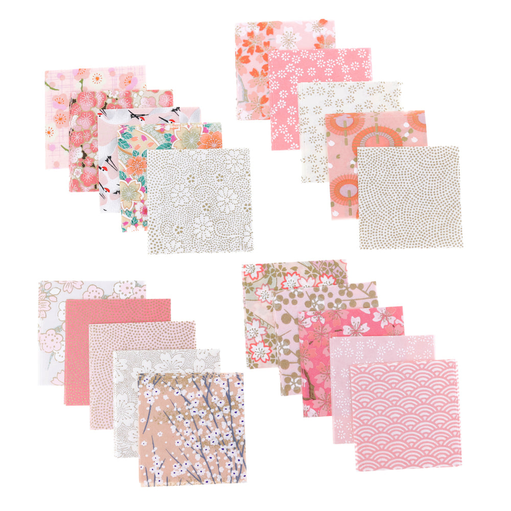 photo packshot de l'assortiment de papiers japonais du set de 100 carrés de papiers japonais adeline klam de 6cm par 6cm dans les tons rose clair, rose pâle, corail, blanc crème et dorés « sakura »