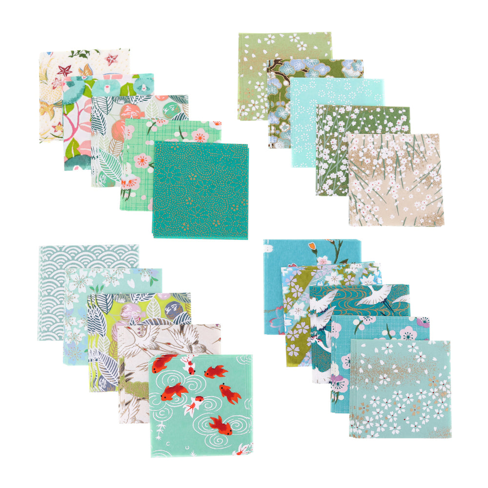 photo packshot de l'assortiment de papiers japonais du set de 100 carrés de papiers japonais adeline klam de 6cm par 6cm dans les tons vert clair et foncé, vert d'eau, menthe, bleu turquoise « garden »