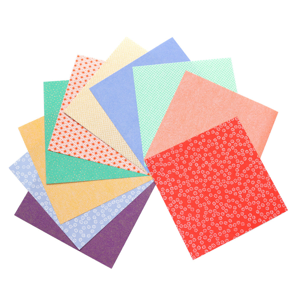 photo packshot de l'assortiment de papiers japonais du set de 7 carrés de papiers japonais adeline klam de 15cm par 15cm dans les tons multicolores « mini motifs »