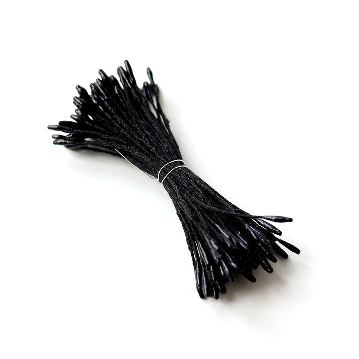 photo packshot de biais du fagot de pistils de fleurs noir brillant (1080)