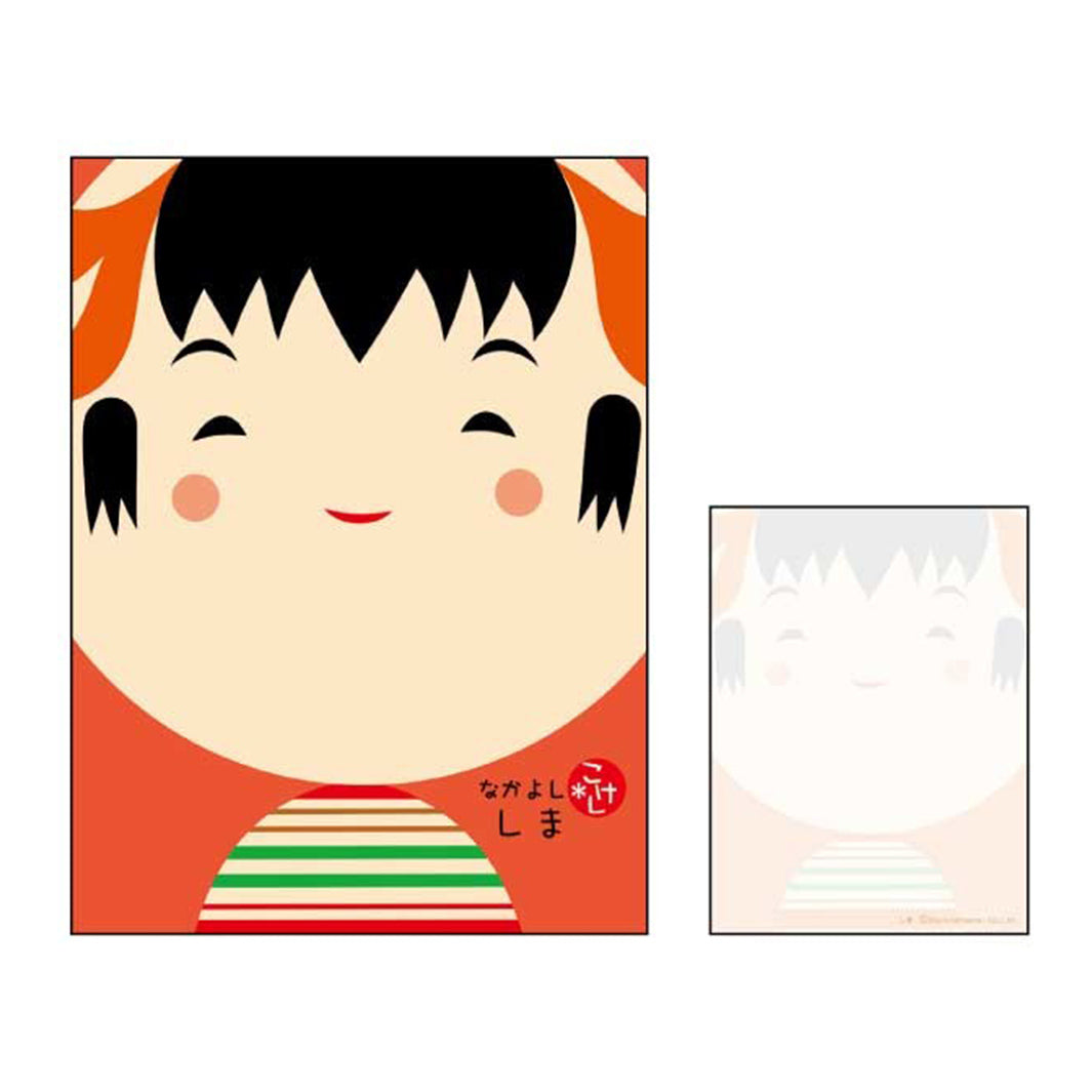 photo packshot du bloc-notes de 70 feuilles au motif de kokeshi sur fond rouge