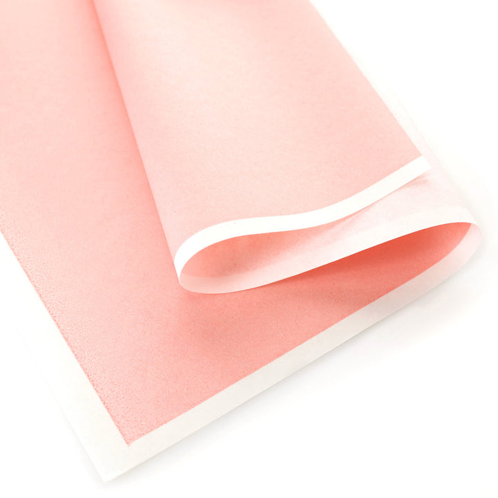 photo packshot d'une courbe du papier japonais yuzen chiyogami uni rose pêche adeline klam (U685)