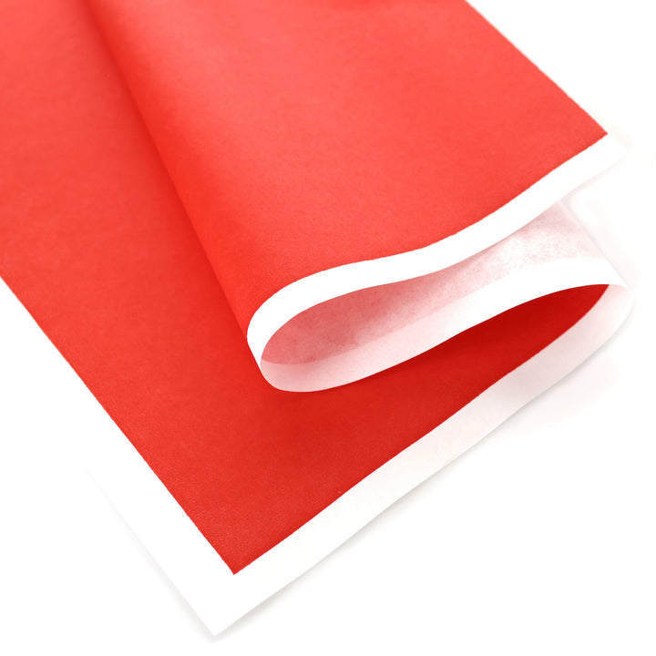 photo packshot d'une courbe du papier japonais yuzen chiyogami uni rouge adeline klam (U532)