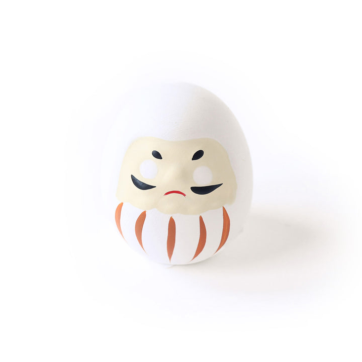 photo packshot d'un daruma en céramique blanche