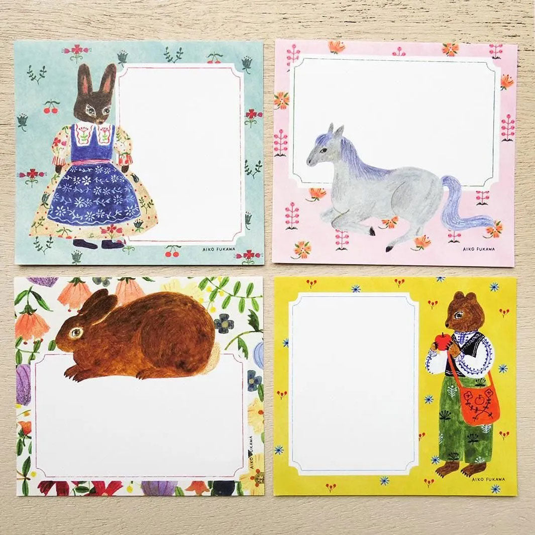 photo packshot du détail des 4 motifs du bloc-notes de 120 feuilles « flower and animals » par Mariko Fukuoka pour Cozyca Products