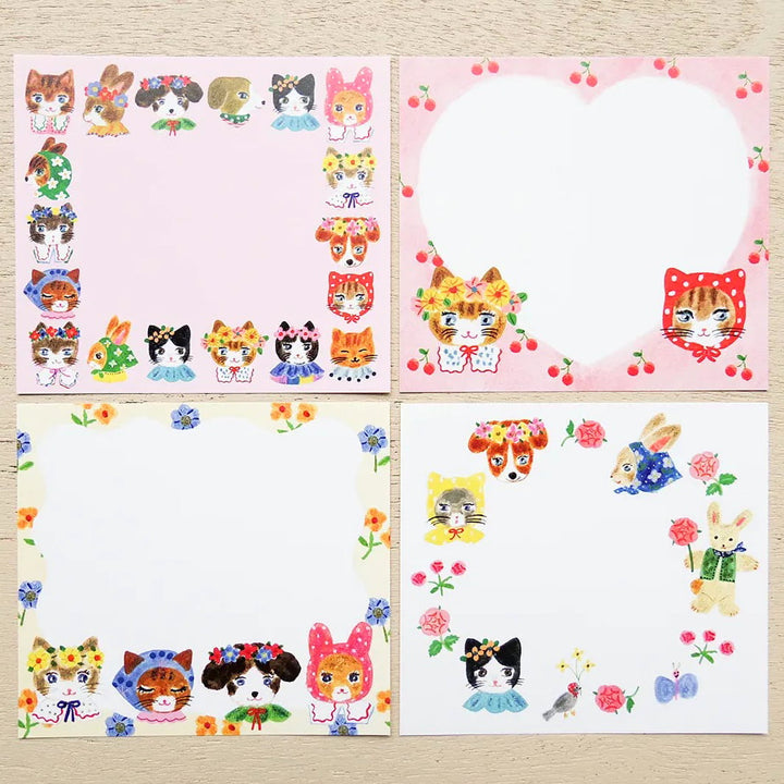 photo packshot du détail des 4 motifs du bloc-notes de 120 feuilles « niko niko smile » par Aiko Fukawa pour Cozyca Products