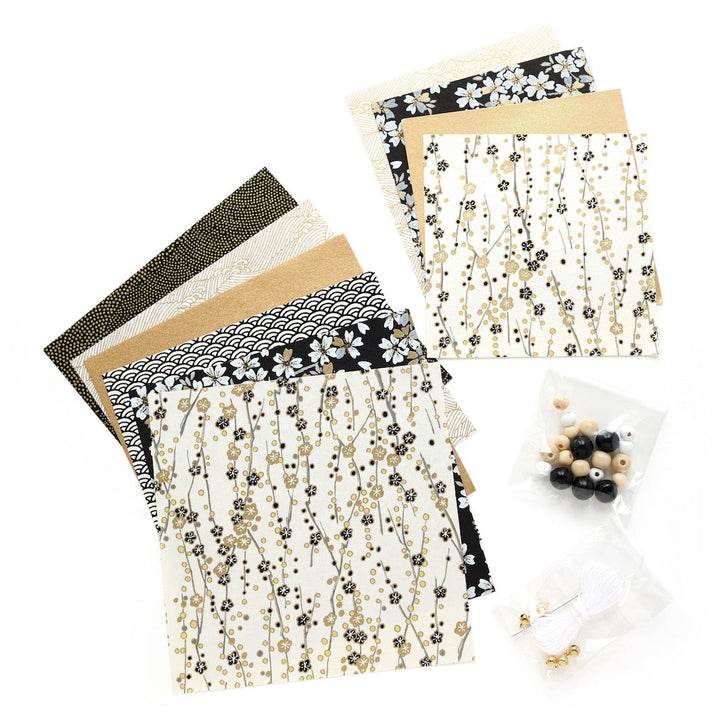 photo packshot d'un détail du matériel du kit pampilles noir, blanc creme et doré « gatsby » adeline klam