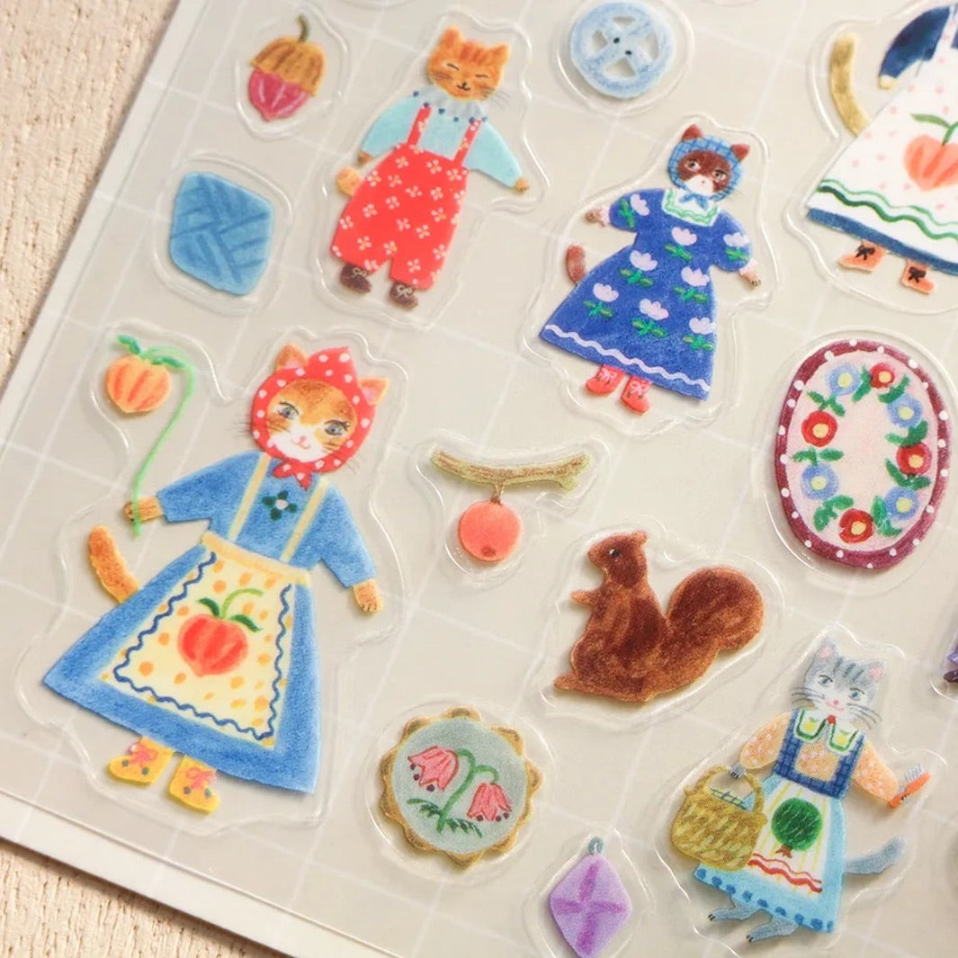 photo packshot d'un détail des stickers de la planche de 55 stickers « cats and buttons » de aiko fukawa pour cozyca products