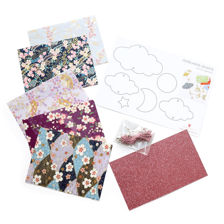 photo packshot des fournitures du kit guirlande de nuages « céleste » dans les tons mauve, lilas, bleu marine et bleu clair « pimprenelle » adeline klam