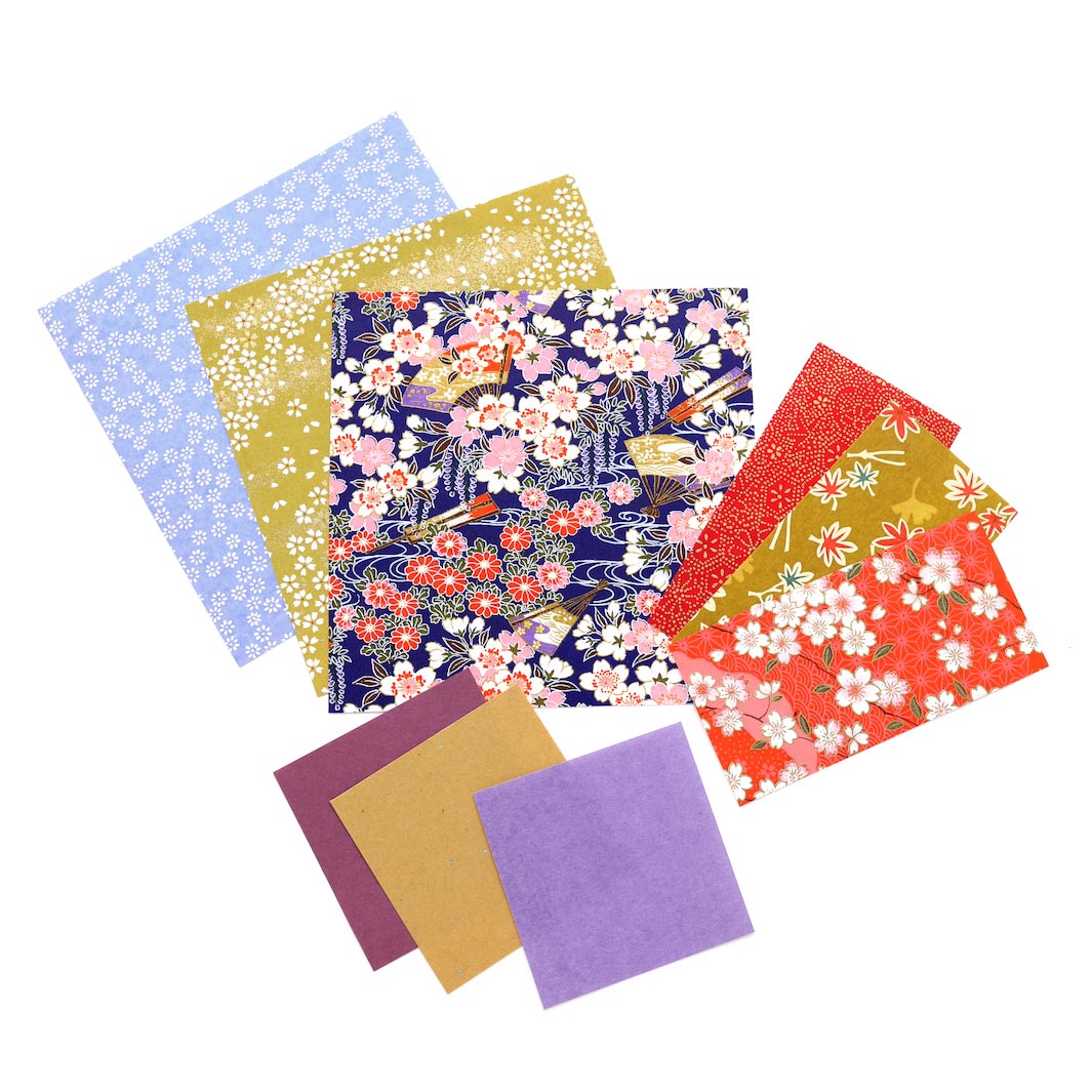 photo packshot de la gamme de papiers japonais du kit poupées japonaises « kimono » dans les tons violets, rouge rose, jaune moutarde et crème adeline klam