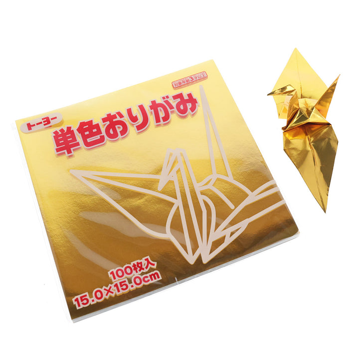 photo packshot des papiers et d'une grue montée du set de 100 papiers origami unis dorés toyo
