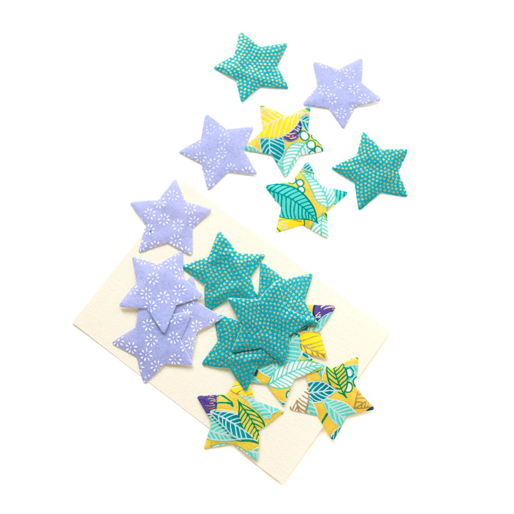 photo packshot du lot de 18 stickers étoile en papier japonais adeline klam dans les tons violet lavande, bleu canard et jaune moutarde « confiserie »