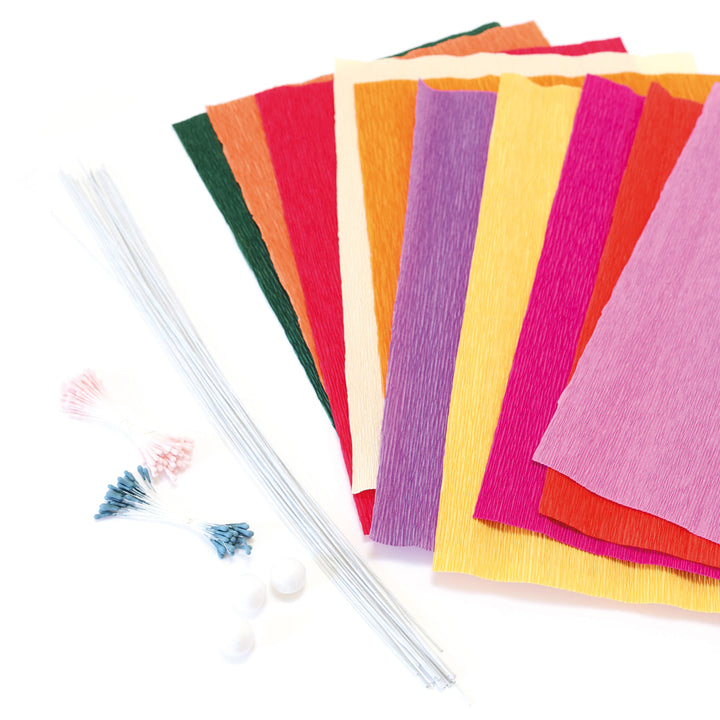 photo packshot du matériel du kit bouquet de fleurs en crépon dans les tons jaunes, orange, rouges, roses, violets et vert foncé « tutti frutti » adeline klam