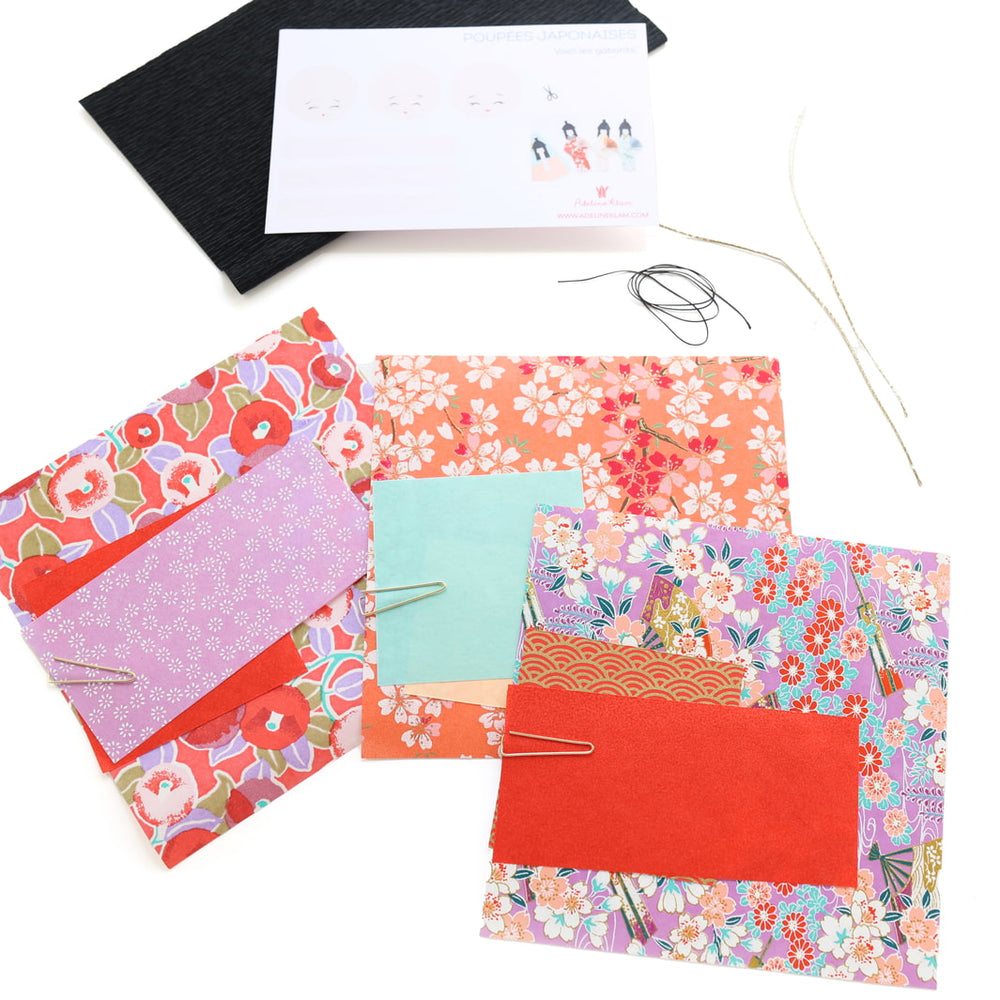 photo packshot du matériel du kit poupées japonaises « hibiscus » dans les tons rouge rose, violet mauve, vert d'eau et corail adeline klam