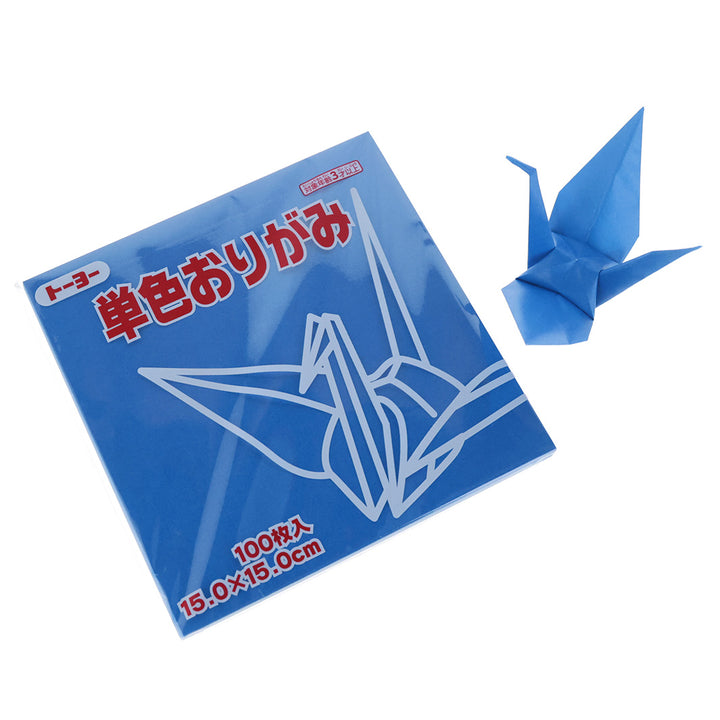 photo packshot du packaging et d'une grue montée du set de 100 papiers origami unis bleu saphir toyo
