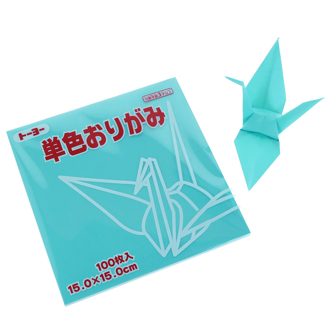 photo packshot des papiers et d'une grue montée du set de 100 papiers origami unis bleu turquoise toyo