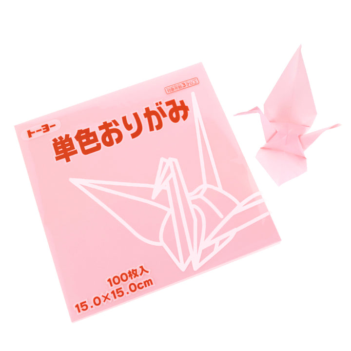 photo packshot du packaging et d'une grue montée du set de 100 papiers origami unis rose pâle toyo