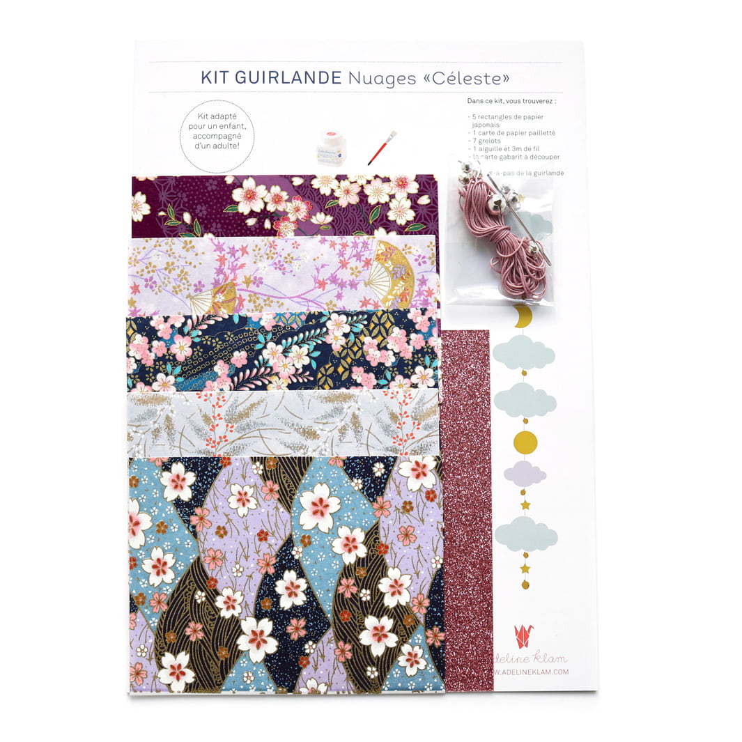 photo packshot du packaging du kit guirlande de nuages « céleste » dans les tons mauve, lilas, bleu marine et bleu clair « pimprenelle » adeline klam