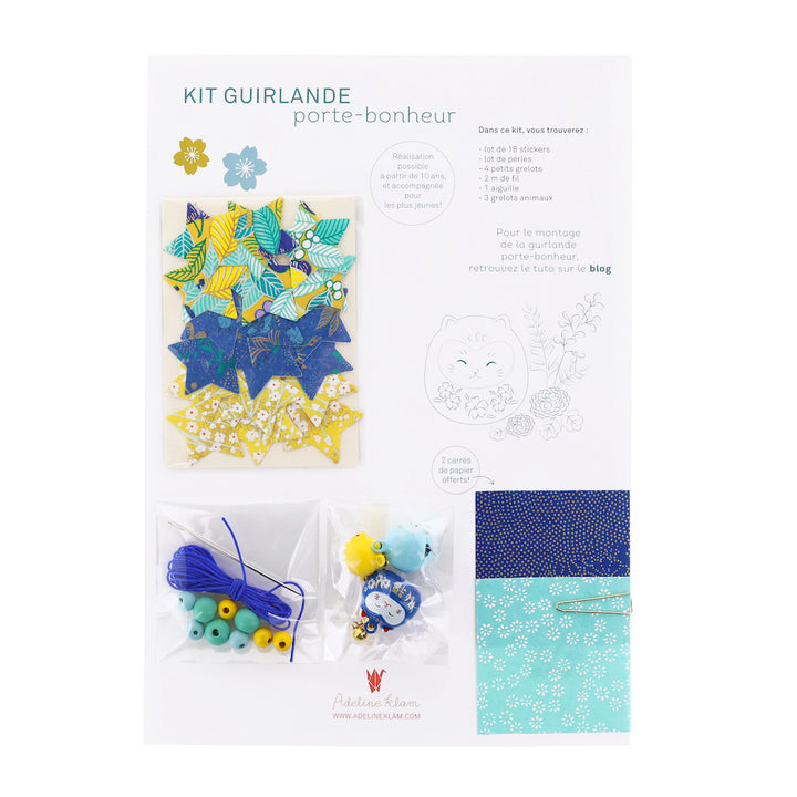 photo packshot du packaging du kit guirlande porte-bonheur bleu roi, vert d'eau et jaune moutarde « luciole » adeline klam