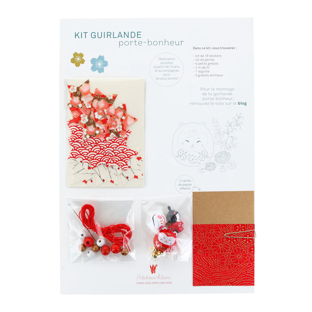 photo packshot du packaging du kit guirlande porte-bonheur rouge, blanc et doré « christmas » adeline klam