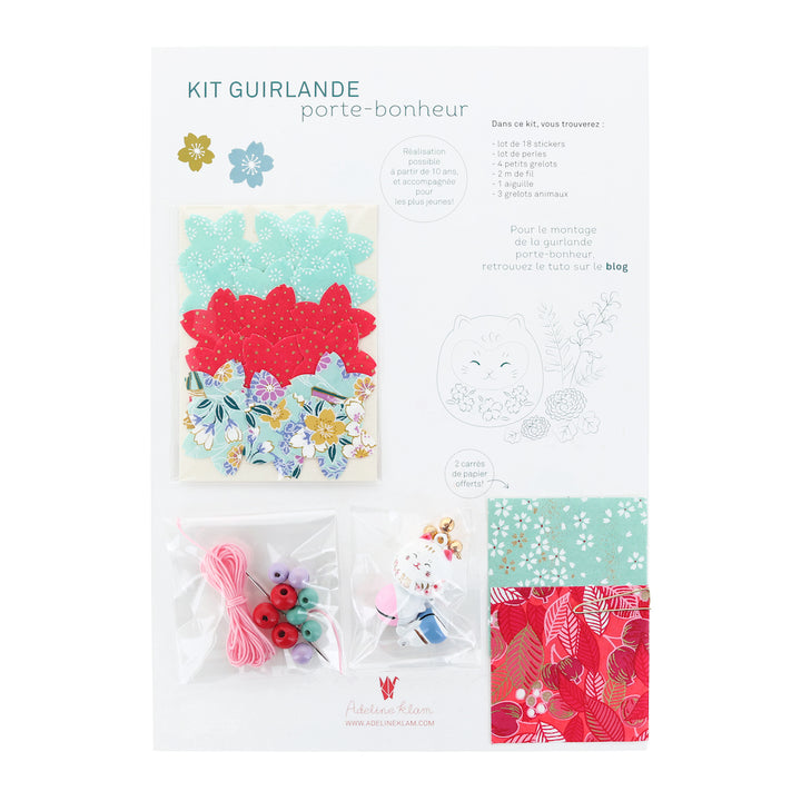 photo packshot du packaging du kit guirlande porte-bonheur vert d'eau, rouge rose et mauve « sorbet » adeline klam