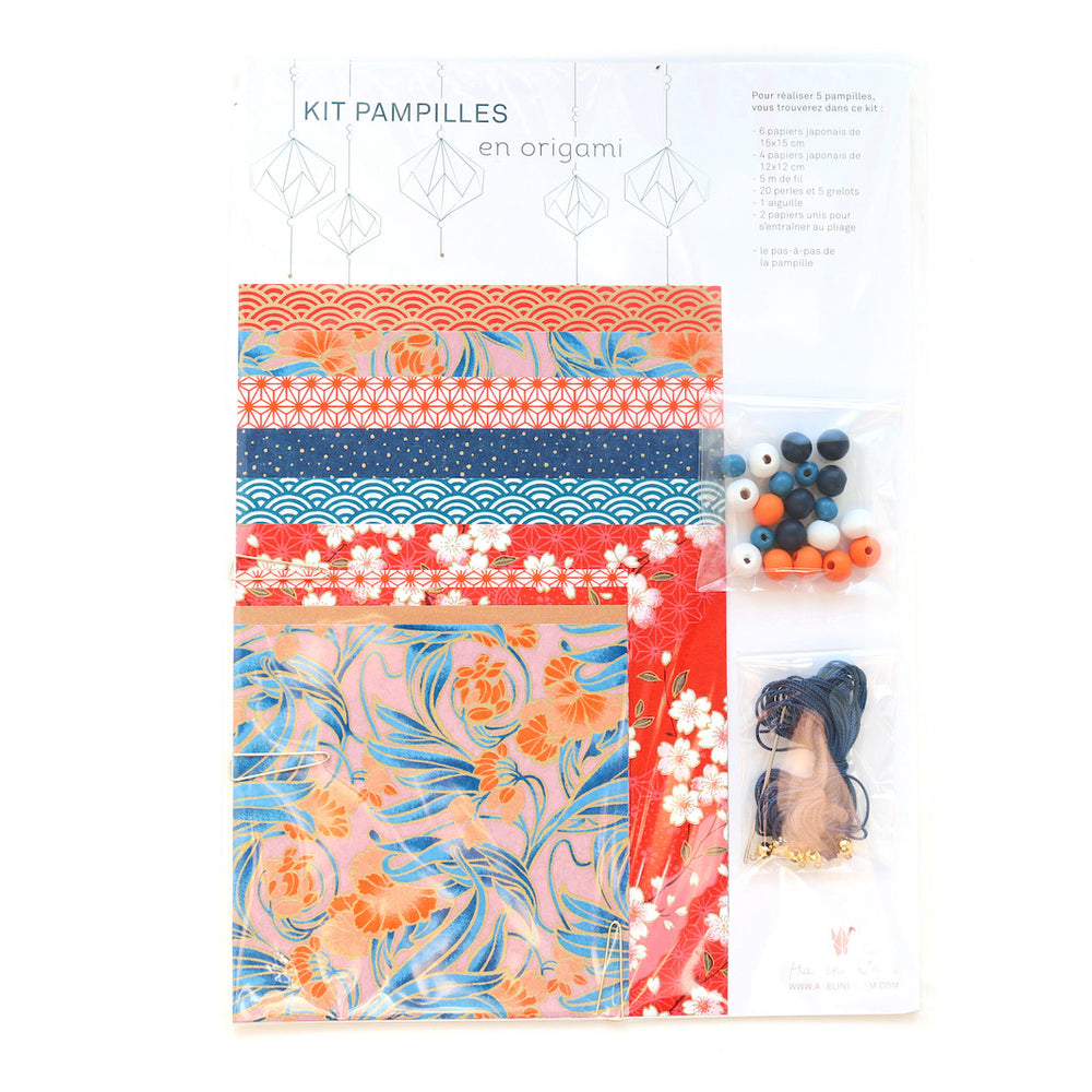 photo packshot du packaging du kit pampilles « william » dans les tons corail, bleu moyen et nuit, roses et dorés adeline klam