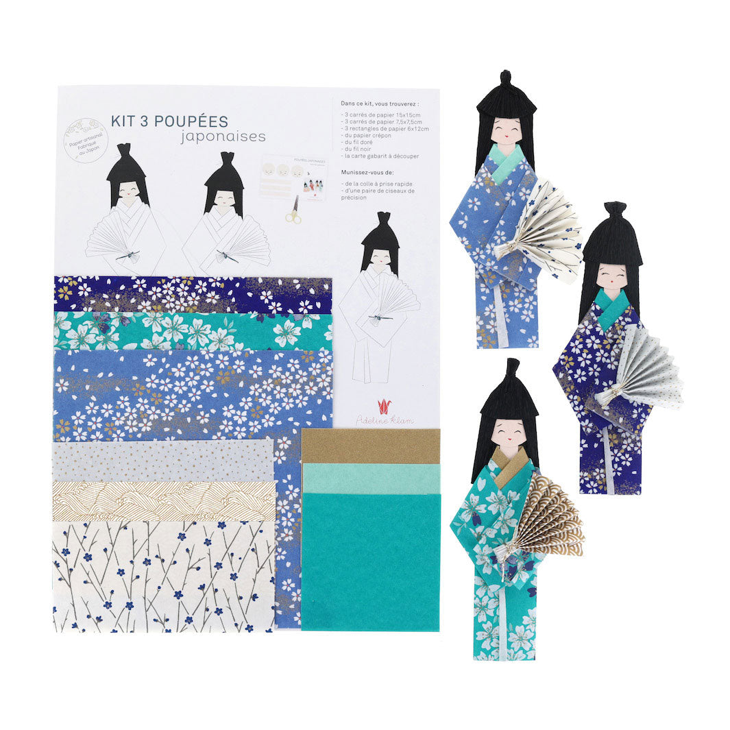 photo packshot du packaging du kit poupées japonaises « okinawa » dans les tons bleu nuit, bleu turquoise, blanc crème et dorés adeline klam